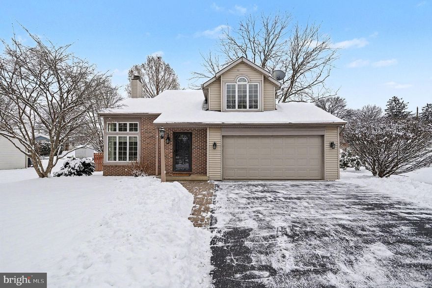 Beautifully designed and ideally located within walking distance to downtown Lititz, this bright four-bedroom home offers three full bathrooms plus a convenient half bath on the main level. The open floor plan is filled with natural light and showcases gleaming hardwood floors throughout.

The front living room features a cozy fireplace, while the expansive kitchen is truly the heart of the home—boasting stainless steel appliances, double islands, abundant cabinetry, and built-in storage and breakfast nook, perfect for everyday living and entertaining. French doors from the kitchen open to a private rear patio, extending your living space outdoors.

The spacious primary suite offers vaulted ceilings, a large walk-in closet, soaking tub and separate full size shower. Three generously sized bedrooms and two additional full bathrooms complete the second floor. The finished basement provides excellent flexibility with space for a recreation room, home office, and plenty of additional storage.

Situated in a wonderful neighborhood close to the library, playgrounds, grocery stores, and all the charm and conveniences of downtown Lititz, this home blends comfort, functionality, and an unbeatable location.