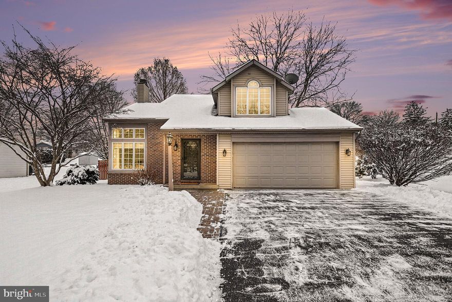 Beautifully designed and ideally located within walking distance to downtown Lititz, this bright four-bedroom home offers three full bathrooms plus a convenient half bath on the main level. The open floor plan is filled with natural light and showcases gleaming hardwood floors throughout.

The front living room features a cozy fireplace, while the expansive kitchen is truly the heart of the home—boasting stainless steel appliances, double islands, abundant cabinetry, and built-in storage and breakfast nook, perfect for everyday living and entertaining. French doors from the kitchen open to a private rear patio, extending your living space outdoors.

The spacious primary suite offers vaulted ceilings, a large walk-in closet, soaking tub and separate full size shower. Three generously sized bedrooms and two additional full bathrooms complete the second floor. The finished basement provides excellent flexibility with space for a recreation room, home office, and plenty of additional storage.

Situated in a wonderful neighborhood close to the library, playgrounds, grocery stores, and all the charm and conveniences of downtown Lititz, this home blends comfort, functionality, and an unbeatable location.