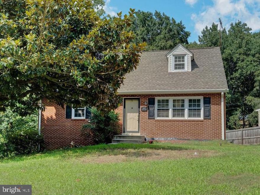 This charming cape cod is located on a corner lot & is mostly all brick! Four bedroom two full bathrooms Full unfinished basement w/workbench & built in shelves, hardwood flooring, easy to maintain yard w/GORGEOUS Magnolia tree & more. This one is a must see!