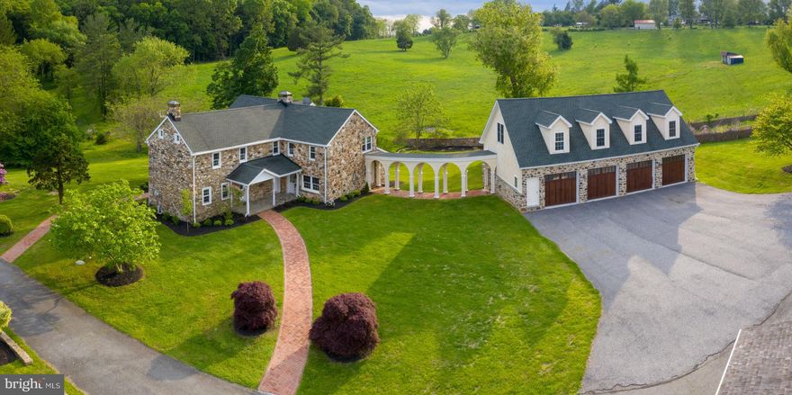 Over 38 breathtaking acres, The original stone farmhouse built in the early 1700s was renovated in 2006, flawlessly combining old and new. With over 4,000 square feet, this home offers formal but open living space to meet today's buyers needs. Gourmet kitchen with wood floors, cherry cabinets, granite countertops and new stainless steel appliances.  Bright cheerful sunroom with French doors leading to deck and access to large brick patio overlooking pond. The formal dining room features traditional mill work and the fireplace is perfect for large gatherings. Second level offers master suite with walk-in closet and private bath. Three additional bedrooms, hall bath and gathering room. Above grade sun filled finished walk-out basement. Above the detached oversized 4 car garage, you will find a spacious loft style apartment with private entrance. The show stopper barn was fully converted in the last 10 years presenting 20ft+ wood beamed ceilings, original stone walls, multi-stalled his and her bathrooms , wet bar, extensive full catering kitchen, multiple office spaces and many oversized windows highlighting the scenic views.  This magnificent property is an entertainer's paradise and is just waiting for all your formal and informal gatherings. The pictures speak for themselves, but the feel of the property must be experienced in person to truly appreciate. Short Walk to the trout fishing streams and hiking trails of White Clay Creek State Park. Perfectly located near main routes into Wilmington, Newark and Philadelphia.  Call today to to see this one of a kind property- you will not be disappointed!*Please call township for potential subdivision