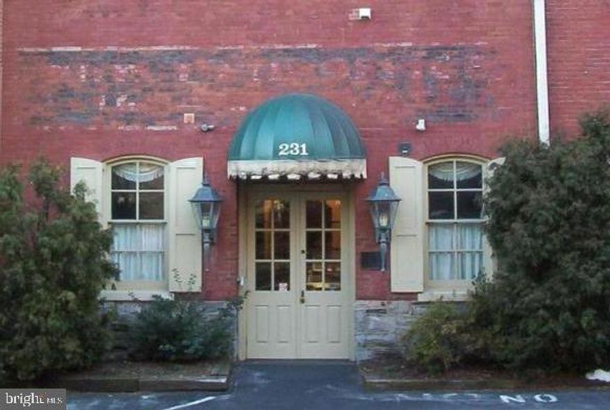 Simple condo living! This former industrial building still shows its old world charm with open floor plan, exposed original wood beams, Original HW floors, large windows and high ceilings.  Never shovel snow or worry about parking with a large private parking lot. All exterior maintenance covered by the HOA. Walk to Musser Park and Downtown attractions. Set in the Tobacco Ave Arts District; this locale won't leave you wanting for art or culture.