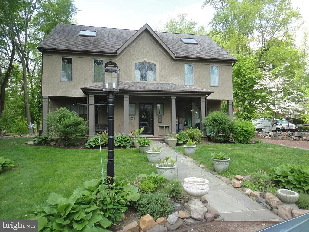 Beautiful 4 bedroom home with hard wood floors and cathedral ceilings. This home with a lovely front porch is nestled on the banks of the towpath, Fabulous molding’s and expansive rear patio. A circular driveway and lavender plantings great you upon your arrival. You are steps away from the towpath and footbridges that take you to all the dining, shopping, and culture for which New Hope and its sister town Lambertville are famous. This includes nightlife like the Bucks County Playhouse and Deck, terrific restaurants like Stella and The Logan Inn, art galleries, festivals the Borough offers. You can enjoy the amenities, and one of the most sought-after locations in the Gold Coast of New Hope.