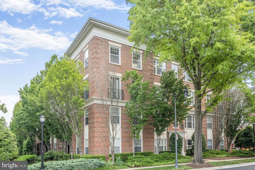 Welcome to The Colonnade at Kentlands! This amenity-rich building offers a lifestyle of convenience and comfort, featuring a two-level fitness center, outdoor swimming pool, Max’s Pub with billiards and party space, a private theatre room, and a resident library.

“The Hawthorne” floor plan includes 3 spacious bedrooms and 2 full bathrooms, starting with a welcoming foyer. The gourmet kitchen boasts stainless steel appliances and opens to the dining and family rooms, both with beautiful hardwood floors. The bedrooms are carpeted for comfort, while the kitchen and foyer are tiled. Each bedroom offers generous closet space, and the bathrooms feature double vanities for added convenience.

This unit also includes an in-unit washer and dryer and comes with two assigned parking spaces (#PU 451 and #105). The building offers plenty of additional guest parking or space for a third car at no extra cost on the lower garage level.

The unit is in impeccable condition—move-in ready and truly a must-see!