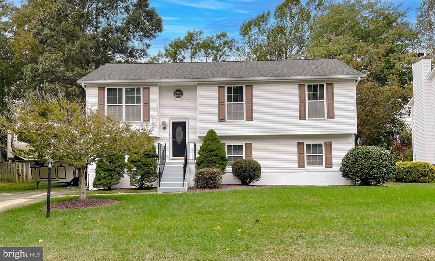 This Bay Ridge Estates Split Foyer offers comfortable living inside and out!  The inside features 3 or 4 bedrooms, 3 full baths, a formal living room w/ cathedral ceiling, open kitchen-dining room, and a lower level family room w/ attached bonus room & bar. If you don't need a 4th bedroom, there's a dedicated home office ready to go. Take note of other appealing details like attractive Pergo flooring, luxury vinyl tile, in-glass door blinds, a propane fireplace, and a 1-yr-old HVAC system. Outside, invite the whole gang for a party on the deck! This big space is made for entertaining and has a central gazebo for when it's time to relax. Set up the games in the flat back yard, and let the kids and Fido run as the yard is fully-fenced.  Fire up the grill on the side patio and pass in the dogs for the big game! With no HOA, you can stow your camper or boat right at the end of the driveway. Located minutes from main commuter routes, shopping and dining, this spacious home makes comfortable living easy. Request your showing today!