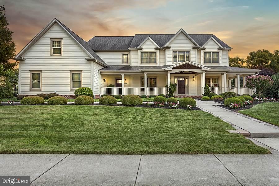 Mechanicsburg SD. Magnificent custom Farinelli in Meadowview. Exquisite detail & millwork. Oak h/wds, layered trim, window seats, crown. Stunning grt rm w/built-ins, fp. Spectacular kit w/dble oven, multiple stone surfaces, DW drawer, 2 islands, prep sink, butlers pant, brkst area. Sumptuous MBR w/tray ceil, 2 w/in closets & opulent bath. 1st floor full bath. Office, LR, DR, Mud rm. Picturesque screened in porch. Pool and fenced yard show off a gardeners oasis. Fnshd basement.