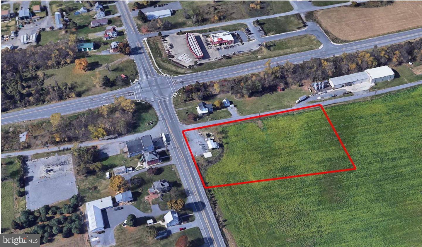 Prime Commercial Location on National Pike (RT 40).•Large Corner Lot: Over 2 acres of space with high visibility, perfect for a wide range of commercial uses. ***AG TAXES PAID!!**• Zoning: BG (Business General) zoning, which allows flexibility for different business types. • Utilities: Public water & sewer hookup available, and on-site electric make development easier and more cost-effective. * High-Traffic Area • Close to Sheetz: Just 2/10th of a mile from Sheetz, a popular convenience store, making it a prime spot for visibility and attracting customers. • Intersection Location: Situated at the intersection of National Pike (RT 40) and Huyet Lane, ensuring heavy foot and vehicle traffic. Strategic Accessibility • Proximity to Major Highways • Only 1.8 miles to Interstate I-70 • 2.8 miles from I-81, ideal for easy access from surrounding areas. • Nearby Shopping and Amenities: 2.5 miles to Garland Groh Blvd Shopping Complex • Approximately 6 miles to the Valley Mall Complex, drawing further foot traffic from a regional shopping hub. Perfect for Development - With these key location advantages, your business could attract significant attention and benefit from the nearby retail and highway traffic.