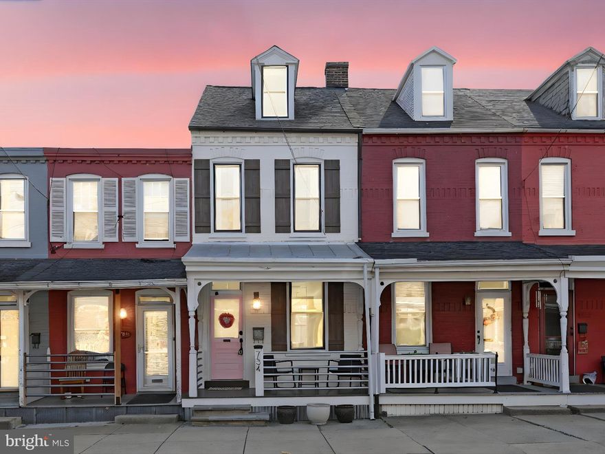 OPEN HOUSE SATURDAY 1-2:30pm! This move-in-ready townhome is ideally located in the vibrant Chestnut Hill within walking distance to F & M University and downtown Lancaster.  The home has been thoughtfully updated with a perfect balance of creativity and practicality. From the welcoming front porch, step into a beautifully designed living and dining area where exposed brick walls and ceiling beams create a warm, inviting atmosphere, ideal for entertaining. The home features durable, easy-to-maintain luxury vinyl plank flooring throughout.  The modern kitchen is a chef's delight, with a stylish combination of cabinetry and open shelving, complemented by a sleek tile backsplash that extends to the ceiling, and equipped with stainless steel appliances. A convenient half bath is also located on the main floor. Step out onto the covered back porch to enjoy your morning coffee while overlooking the charming backyard.  The second floor offers two spacious bedrooms and a full bathroom with a tiled shower, as well as a thoughtfully placed laundry area for added convenience. The third floor houses a cozy bedroom retreat, perfect for guests or a private workspace. With economical natural gas heating and central air, this home provides comfort and efficiency, making it a must-see!