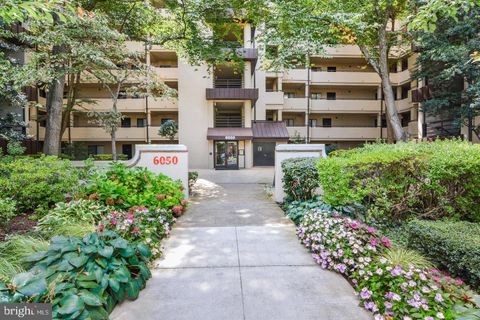 Photo of 6050 California Circle #404, ROCKVILLE, MD 20852 (MLS # MDMC2200890)