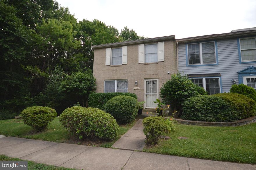 Immaculate, Gorgeous and very well maintained 3 level end unit brick front townhouse. Hardwood floors on Main and Upper Levels. Master bed w/full bath and walk in closet. Spacious walkout basement with wood fireplace & full bath. Separate dining room and upgraded kitchen. Large deck off dining room & nice patio. Fenced back yard. Backs to woods. close to I95, commuter lot, Quantico & Shopping.