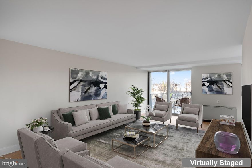 This bright and airy two-level one-bedroom condo located just minutes from major commuter routes into the city has been completely renovated and freshly painted from throughout. This unit also features new luxury vinyl flooring and new carpet. The main level features a bright, spacious living and dining combination highlighted by a wall of windows (sliding doors)  that brings in abundant sunlight. The updated kitchen includes modern soft-close gray shaker cabinetry, an elegant backsplash, and a generous pantry with pull-out shelving for excellent storage solutions. Upstairs, the primary bedroom suite boasts luxury vinyl flooring, a large closet, and a beautifully updated en-suite primary spa bath with rain shower and gorgeous tile surround/ flooring.  There is also an enormous balcony! The laundry room is conveniently located just across the hall. Covered garage space conveys.  All utilities are included in the condo fee, and a storage unit conveys. Community amenities include an outdoor pool, fitness center, 24/7 front desk security, and on-site laundry.