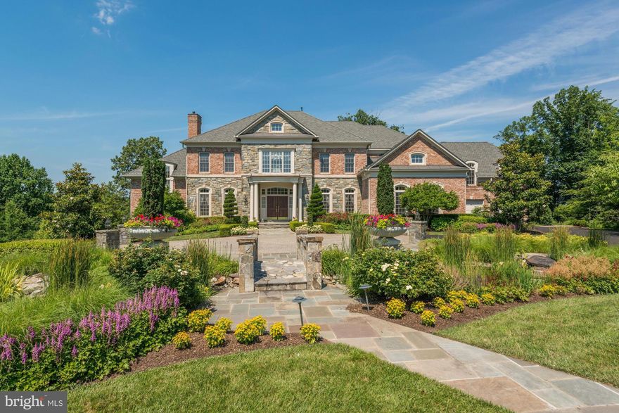 Stunning bright & sunny home w/extraordinary landscaping & fabulous backyard pool, patios and outdoor kitchen. Great home to enjoy w/family & friends. Two-story music room. Spacious gourmet kit opens to large fam rm & sunrm. Beautiful master bdrm suite w/fireplace & gorgeous vistas from the wall of windows. All bedrms are large.  LL w/wine cellar, theater, exercise rm, etc! Approx 10,000 sq ft.