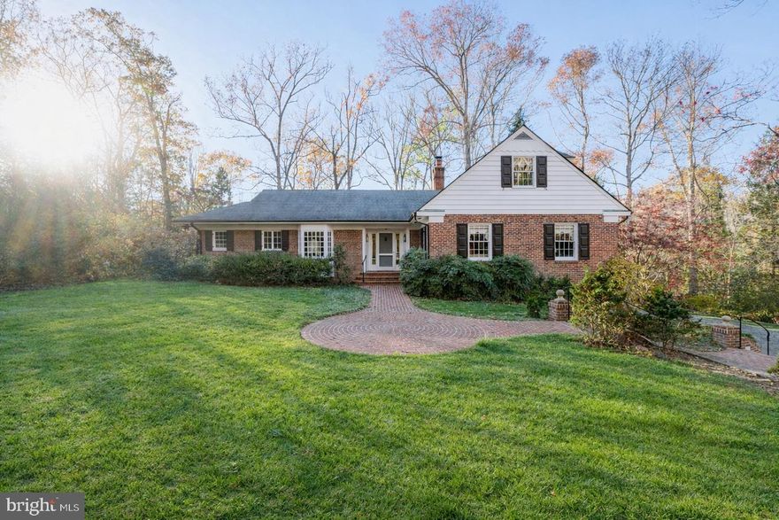 NEW ON MARKET! FIRST OPEN HOUSES SAT and SUN 2/21 & 2/22 2-4PM

Start with the idea that something about this home will stick with you long after you see it. It might be the charm, the privacy, the view as one enters the house, the pool, the grounds, the creek, or the walnut paneled lower level that has hand forged iron works and a cozy stone front fireplace. One way or another don’t be surprised if you find yourself thinking about life at this private retreat located on the end of a quiet cul-de-sac in Potomac.  Lovingly cared for by the same owners for more than 45 years, the home and grounds reflect true pride of ownership, with custom details and quality craftsmanship throughout.

Set on 5.6 wooded acres with a creek winding through the property, the home offers exceptional privacy with a stunning natural backdrop, enriched by abundant woodland gardens and a remarkable variety of azaleas, rhododendrons, dogwoods, hollies, ferns, and native wildflowers to name just a few of the cast members that create a year-round show. Mature landscaping and refined hardscaping create inviting outdoor living spaces, that are perfect for solitary reflection or large gatherings. The outdoor spaces include a screened porch, large patio spaces, a heated pool, outdoor fireplace, and stone retaining walls designed to accent areas of the yard while creating additional planting areas. 

Inside, the main level features a spacious formal living room with a wood-burning fireplace that flows into an elegant dining room. The eat-in kitchen is designed for everyday comfort and effortless entertaining. A screened porch off the dining room and kitchen extends the living space and captures views of the beautiful grounds.

Down the hall, the main-level primary suite is filled with natural light from expansive windows and enjoys a peaceful, tree-lined backdrop. A second main-level bedroom with an ensuite bath provides flexibility for guests, a home office, or additional living space.

Upstairs, two additional bedrooms share a well-appointed hall bath. A spacious attic provides convenient extra space.

The lower level that walks out to the patio and pool and was remodeled with an eye to an earlier era by a craftsman who created this one of a kind space complete with walnut paneling, stone front wood-burning fireplace, cozy 2nd kitchen with a party sized dining area and comfortable family room area. The lower level has a full bath and direct access to the oversized two-car garage.

This is a rare opportunity to own a truly special property in Potomac—where privacy, character, and timeless charm come together beautifully, just a short distance from Potomac Village, major commuter routes, shops, and dining.