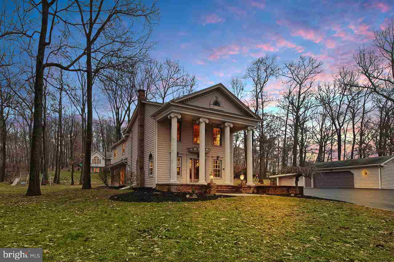 Large estate style home w/ grand entrance w/16 ft columns. Amazing 4BR & 2.5BA w/ master suite w/ private balcony overlooking grounds. 3 car garage, custom KIT w/ granite counters & oversized farm sink. 1st flr FR w/ fireplace, study/office w/cherry custom built ins, all new flooring, paint, roofing, ceramic tile in all baths, and HW floors. Gorgeous outdoor patio for entertaining guests. Call today to customize your own renovation!