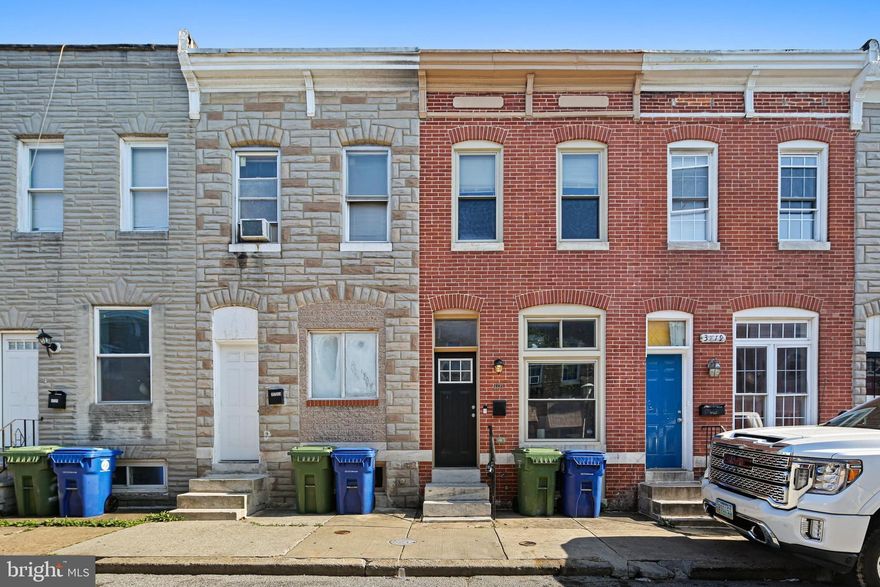 Welcome to this completely renovated Highlandtown row home nestled on a quiet street in vibrant Baltimore Highlands. Built in 1922 and fully transformed in 2018, this stylish 2‑bedroom, 1‑bath townhouse offers approximately 768 sq ft of turn‑key living with new electrical, plumbing, HVAC, double‑pane windows, and insulated doors for worry‑free ownership . Inside, discover exposed brick walls, gleaming hardwood floors, recessed lighting, and a traditional floor plan with cozy eat‑in kitchen and breakfast area. The modern kitchen shines with stainless steel appliances, white cabinetry, under‑cab lighting, tile backsplash, and granite countertops that connect seamlessly to the fenced-in private patio . Upstairs, two spacious bedrooms and a centrally located full bath deliver comfort and convenience, while the unfinished basement—complete with laundry area and sump pump—provides excellent storage or expansion potential. With on‑street parking, and no HOA! Don't miss out!