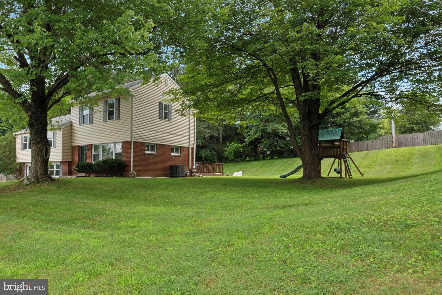 Exceptionally well-maintained 4-bedroom, 2.5-bath home offering over 2,195 sq. ft. of thoughtfully designed living space in a centrally located and highly sought-after location in West Chester. Major recent upgrades—including a brand-new HVAC system (2024), a new roof (2022), and a new hot water tank (2023)—ensure peace of mind and long-term comfort.
Inside, the rare and versatile split-level layout creates distinct yet connected living zones. The main level features a spacious living room, a formal dining area, and an open-concept kitchen—ideal for everyday living and entertaining. French doors off the dining room lead to a generous rear deck overlooking a private backyard oasis, perfect for outdoor dining, gardening, or simply unwinding in nature.
Just a few steps up are three generously sized bedrooms and a full hallway bath. Upstairs, the private primary suite boasts its own full bathroom and a large walk-in closet—providing comfort, privacy, and convenience.
The lower level, accessible just off the kitchen, includes a family room and a convenient half bath—perfect as a guest space, home office, or playroom.
The home offers a smart blend of heating and cooling solutions. A newly installed central air (HVAC) system, located in the attic, provides air conditioning and heating. Meanwhile, a hot water radiator system, located in the lower level, provides steady, comfortable heat throughout the home, except for the primary suite, which is heated by the central air system—balancing efficiency with comfort.
Located within the highly desirable West Chester School District and just minutes from shopping, dining, train station (Amtrak/Septa), and local parks, this home combines modern updates, flexible living space, and an unbeatable location.
