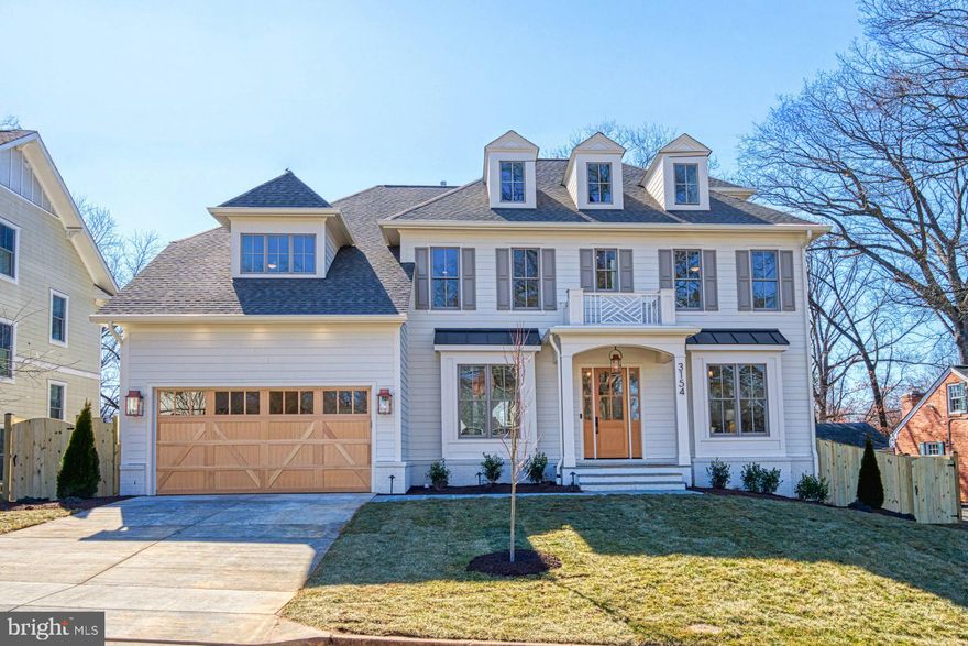 PRICE REDUCED!!! Nestled in the rolling hills of sought-after Bellevue Forest is another spectacular custom home by popular builder M-R CUSTOM HOMES. With nearly 6,700 finished square feet of living space on a 9,865 square foot lot, this home features 7 bedrooms, 7.5 bathrooms on 4 levels, including a main floor bedroom/study with full en suite bathroom. The home chef will love this home's showcase gourmet kitchen featuring a 48" Wolf gas range, 48" Sub Zero refrigerator, 30” Wolf microwave, Bosch dishwasher, huge island with 2 ½” quartz countertops, under-sink water filtration system, large walk-in pantry, and custom inset maple cabinetry. The beautiful kitchen is open to the family room with its 42” ventless gas fireplace, coffered ceiling, and with access to the screened porch. Gaze at the 6th hold of Washington Golf & Country club as you enjoy your morning coffee in the breakfast area or afternoon cocktail on the screened porch. A formal dining room with Butler’s pantry, a separate living room/library with French doors, a powder room, and a spacious mudroom with built-in cubbies and bench and designer tile complete the main level. 10’ ceilings on main level. 7” White Oak flooring throughout main and upper levels. Head upstairs to the luxurious primary suite with its his-and-hers large walk-in closets and a spa-like primary bath with double vanity, frameless heavy-glass enclosed shower, freestanding soaking tub, and heated floors. Three secondary bedrooms, all with full en-suite bathrooms, and a laundry room complete the upper level. The 3rd floor loft, with full en-suite bathroom, is ideal for a private office, guest suite, or au pair suite. The spacious basement features an expansive recreation room with Luxury Vinyl Plank (LVP) flooring, a wet bar, a bedroom with large walk-in closet, a full bathroom, an exercise room with rubber flooring, and a finished storage room. 9’ ceilings in upper level and lower levels. Loads of storage on every level. Ceiling mounted speakers in kitchen, dining room, family room, screened porch, primary bedroom and bath, and basement rec room. Ring/Nest doorbell. 3-season screened porch off the main level with its all-weather Trex flooring, skylights, ceiling fan, heaters, grill gas line, and stairs leading to the back yard make this home perfect for entertaining. 2-car garage with epoxy flooring and EV charger. Within a mile of Washington Golf and Tennis Club, Gulf Branch Nature Center, Zachary Taylor Park, Potomac Heritage Trail, and Donaldson Run Park/Marcey Park/Potomac Overlook Regional Park with their multitude of sports courts and nature trails. Close to Arlington shops, restaurants, and entertainment. JAMESTOWN ES, WILLIAMSBURG MS, YORKTOWN HS.