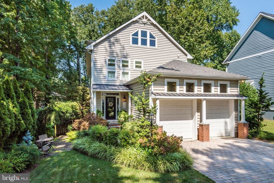 SUNDAY OPEN HOUSE CANCELLED.  Enjoy the Bay Ridge Lifestyle in this spacious, updated, move-in ready home located around the corner from the Bay Ridge Marina. Set back from the street on a lushly landscaped lot, this home is great for entertaining as well as for getting away from it all. The three-season porch, back deck, and tree house all provide great spots for relaxing after a day on the boat or afternoon at the beach. Work from home in the first OR second floor office! Cooks will love the tastefully remodeled kitchen with loads of storage, marble countertops, high-end stainless appliances, and large walk-in pantry. Enjoy high ceilings, Brazilian cherry and eco-friendly bamboo hardwood floors, large second floor laundry room, and master suite overlooking a secluded deck and beautifully landscaped backyard. The newly renovated third floor with two bedrooms, a full bath, skylights, and a living / sitting room works well for family members, guests, in-laws or an au pair; the large unfinished basement with outdoor access and roughed-in plumbing is terrific for storage or could be finished to add even more living space; an attached two car garage and paved driveway provide plenty of parking. The Bay Ridge Community offers residents a private pool with six 25 meter lanes and a 300 square foot baby pool; private beaches on the Chesapeake Bay; a Marina with 116 pier slips, helix moorings, a pump out station, and boat storage racks; a Clubhouse with a playground and basketball court; and a variety of community events and traditions including the Bay Ridge 4th of July Parade and Jamboree. This is Bay Ridge at its best!