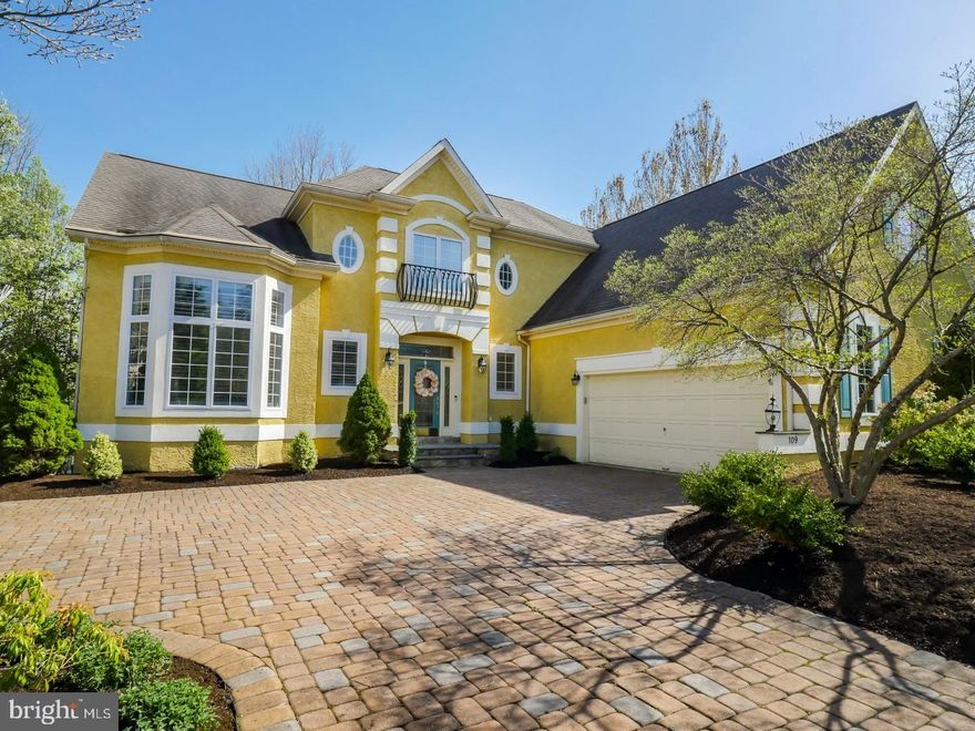 This beautiful 4 bedroom home boasts extremely spacious living, impressive views, numerous upgrades, a unique floor plan and is located in the highly desirable Estates of Riverwoods. From the expansive courtyard style driveway, the beautiful leaded glass entry opens to the spacious foyer giving you an immediate view of the dramatic great room as gorgeous hardwood floors flow throughout the main level. The formal dining room with window lined alcove offers the luxurious details of shadowbox moldings, plantation shutters and wide crown molding - all signature details through the home. Recently upgraded, the gourmet kitchen is a stunning blend of softened white cabinetry, tiled backsplashes and tumbled marble counters that bring in an array of earth tones. Highlights of the chef's space include Viking stainless steel appliances and double door beverage fridge. In addition, you have a large pantry and bright casual dining room that leads to the deck and brings in the natural views. With a soaring ceiling and pillared accents the great room creates an inviting gathering space. The gas fireplace is flanked by stacked windows to allow for plenty of natural light to fill the room. There is also a large inset study perfect for an office or den if you choose. The owners can enjoy the ease of a first floor master, where a tray ceiling is layered with wide crown molding and the windows are clad with plantation shutters. There are two huge walk-in closets for complete wardrobe organization and an opulent master bath featuring a soaking tub with a view, dual vanities and a wide frameless glass shower with bench. A spacious loft area sits above the great room to create a relaxed lounging space. Bedroom two with theatrical ceiling and skylights is generously sized, has a double closet and private bath with natural light. The third and fourth bedrooms also offer their own original details and character with high ceilings, ample closet space and a shared common bath featuring a double vanity. Adding a casual entertaining mecca, the finished basement has walk-out access to the covered patio and plenty of extra storage. Outdoor living is at premium with the expansive deck that offers cozy nooks and the landscaped patio that takes in the wooded vista. With a great commuter location, Award winning New Hope-Solebury Schools and the ability to walk into New Hope Boro, this property should be at the top of your list.