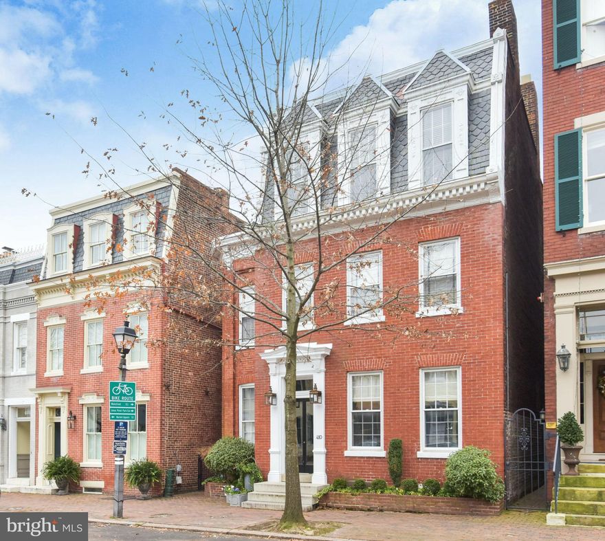 Welcome to 410 Prince Street - Located in the heart of Old Town, this fully detached townhouse offers a compatible blend of antique, vintage and present day designs. Behind its stately, brick exterior a truly comfortable home awaits. A rounded vestibule and wide foyer provide a gracious entry in to the stair hall and expansive double parlor style living room. Beyond, an airy Hyphen Hall with Victorian roof lantern does double duty as a bar and cloak room. Beyond is a spacious family room with gas fireplace, custom built-ins and French Doors out to the sunny enclosed garden. An updated kitchen with abundant custom cabinets and top tier appliances including 6 burner AGA cooker will please cooks of any ability. The sunny and skylit dining room is glazed in newer windows and has wonderful views of the garden. Upstairs there are 4 Bedrooms (3 En-Suite) and 3 bathrooms. A Pinterest-worthy bedroom level laundry room makes garment care a joy. The garden is fully fenced with mature plantings including cloud-pruned boxwoods and provides lovely outdoor entertaining spaces. Not to be missed is a charming screened porch complete with heating for 4 season enjoyment. Off Street parking for one car.