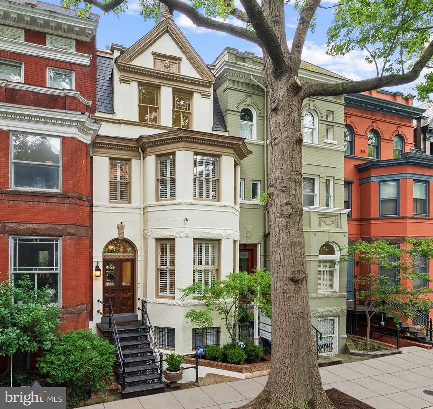 Located on one of Dupont Circle’s most sought-after streets, 1762 Church Street NW is a stunning blend of historic Victorian architecture and contemporary design. Originally built in 1905 and completely renovated and expanded in 2011 by Glass Construction, the home now features a significantly larger footprint and modern layout.

Highlights include over 10-foot ceilings, walnut-stained hardwood floors, and dramatic natural light from multiple skylights and a south-facing wall of floor-to-ceiling windows (you need to see this in person to understand the significance of natural light improvement this makes). 

The main residence offers 3 bedrooms, 3.5 bathrooms, an open-concept living area, and preserved architectural details like original façade windows and period fireplaces. The second level features a spacious primary suite and media room, while the third floor includes two ensuite bedrooms, a laundry room, and access to a panoramic rooftop deck via a striking spiral staircase.

Additional amenities include two balconies, a private rear terrace, secure off-street parking, and a separately metered, fully legal one-bedroom unit on the lower level—ideal for guests or rental income. 

This thoughtfully designed home offers luxury, character, and flexibility in the heart of Dupont.

Recent upgrades from current owners include a custom banquette designed by Ankie Barnes, new HVAC systems, a new vanity in the primary bathroom, and new custom Elfa shelving in the primary closet.