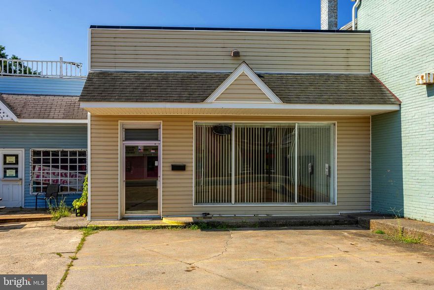 High visibility commercial building on Main Street in the heart of downtown Luray! Located within the Small Business Administration’s HUBZone and zoned B-1 offering numerous opportunities. Discover the versatility of this commercial building ideally situated, complete with hard-to-find dedicated/private parking right off Main Street. This commercial property is located in close proximity to downtown entertainment, shopping, and restaurants, and awaits your next business / investment opportunity. Inside you will find a functional layout featuring a welcoming lobby, four large offices all with ample storage space, two restrooms, a central common area perfect for an additional workspace or storage, and a kitchen/break area. This building has an updated interior/electrical and is fully networked!  Whether you are launching a new business venture, expanding / relocating operations, or looking to invest in a growing market, this centrally located commercial property is a true standout opportunity in the heart of downtown Luray.