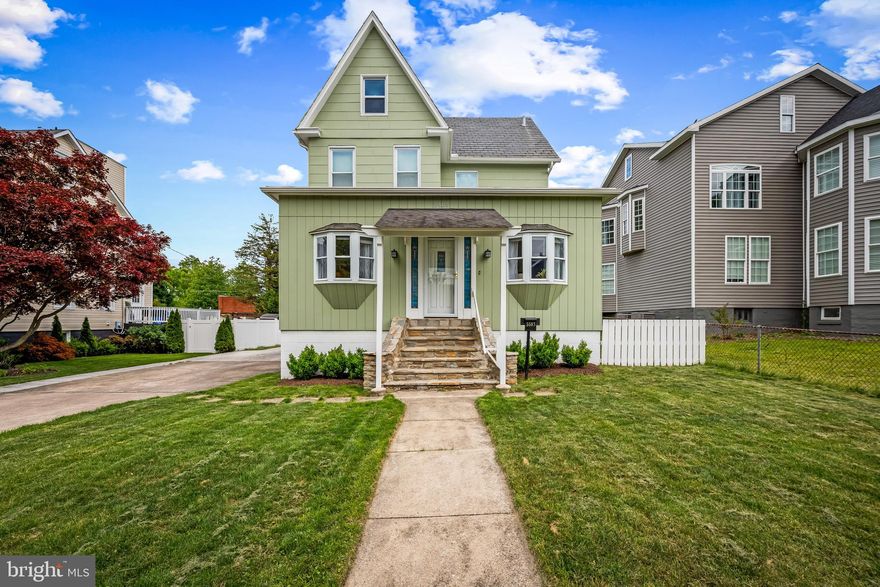 Welcome to this beautifully updated Hamilton Lauraville home in Northeast Baltimore, offering the perfect blend of Baltimore City living and a suburban neighborhood feel. Situated on an extra large level lot with extensive off street parking, fenced yard, covered deck, and flexible living space, this move in ready property is a rare find in one of Baltimore’s most sought after communities.

As you enter the home, you are welcomed into the owners’ beloved “Sporch,” an enclosed sunroom porch that serves as an inviting extension of the living space and the perfect spot for morning coffee, family meals, casual gatherings, or relaxing evenings with friends. Beyond the Sporch, a foyer opens into a spacious living room featuring charming built ins, refinished original hardwood floors, and thoughtfully coordinated oil rubbed bronze fixtures and hardware selected to complement the home’s 1914 character. Original and updated period appropriate six inch base moldings throughout the home further enhance its timeless architectural appeal.

Just off the kitchen is a practical mudroom and full bath, creating an ideal everyday layout. At the rear of the home, a large covered deck overlooks the expansive level backyard, offering exceptional space for entertaining, gardening, pets, outdoor dining, and summer barbecues.

The second floor features three comfortable bedrooms and a full bath, along with original second floor hall doors complete with charming vintage hardware that elegantly separate the bedroom area. Original and period appropriate five panel doors throughout the upper level help preserve the home’s architectural integrity. A beautifully researched stained glass front door, believed to be true to the home’s original 1914 design, further enhances the property’s timeless character.

The unfinished basement offers abundant storage and laundry space. The home is kept comfortable during the summer months with window air conditioning units.
Meticulously maintained and extensively updated over time, this home reflects true pride of ownership throughout. No stone has been left unturned, allowing buyers to move in with confidence knowing the property has been carefully improved and exceptionally cared for.

Located in the heart of Hamilton Lauraville, this home offers easy access to downtown Baltimore, Towson, Johns Hopkins, Morgan State University, I 695, and I 83. Enjoy nearby neighborhood favorites like Zeke's Coffee, Domesticity, Snug Books, Wax Atlas Record and Stereo Exchange, and Koco's Pub. Outdoor enthusiasts will also appreciate close proximity to Herring Run Park, a 375 acre urban oasis with wooded trails, streams, athletic fields, and green space rarely found so close to the city.

Owners would like a quick closing with occupancy through July 15, 2026.