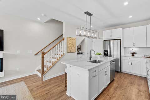Photo of 6 Sepia Square #MO, ASHBURN, VA 20147 (MLS # VALO2127122)