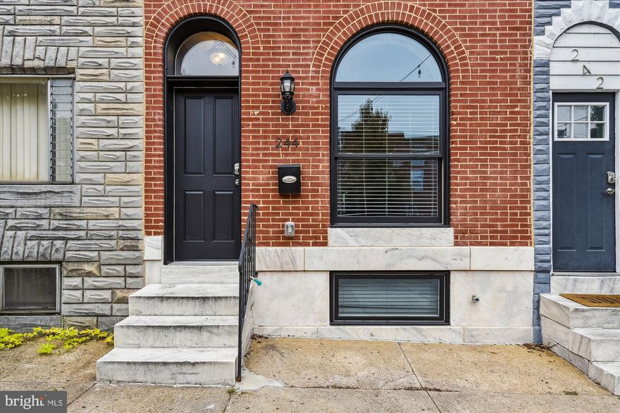 Rare and Remarkable Patterson Park Renovation with over 2400 square feet of premium finished living space.  Property highlights include 4 beds, 3 full baths (perfect opportunity to rent out rooms for additional income), parking pad and a roof-deck!  Features include exposed brick, gourmet kitchen including stainless steel appliances/42" custom trimmed cabinetry/granite/island/backsplash/under cabinet lighting, center roof-deck access, hardwood flooring, ceiling fans, recessed lighting, historical vestibule, custom tiling in all baths and much more!  Best for last, over 6 years on the Historical CHAP Tax Credit (taxes approx $2,966)!