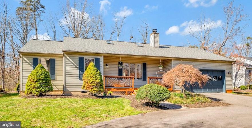 Come see what this lake life is all about! This fantastic one-level home offers new main living area flooring, an open floor plan, vaulted ceilings, a stone fireplace, and a spacious kitchen, all contributing to a cozy and inviting atmosphere. The kitchen boasts an expansive island and stylish open shelving. Wait until you see the owner's suite, where the en-suite bath and walk-in closet add a touch of luxury, providing a comfortable retreat within the home. The rear deck and gazebo offer great opportunities for outdoor relaxation and entertaining, with the level, wooded private backdrop providing a serene setting to unwind or an ideal place for family fun while enjoying the natural surroundings. 312 Yorktown is the perfect blend of indoor comfort and outdoor beauty, ideal for anyone looking to experience the tranquility and lifestyle that the private, gated, secure community, Lake of the Woods provides. Home to two lakes (the 550-acre main lake and a 35-acre "fishing lake"), a golf course, an equestrian center, a fire and rescue department, and a church all within the gates, Lake of the Woods simply has it all. Whether your passion is boating, water skiing, kayaking, golfing, horseback riding, or simply taking in the breathtaking views from the clubhouse while enjoying a fabulous meal, from your deck or yard, or from one of the beaches, you won't be disappointed! Perhaps you'd like a game of bridge or volunteer your time and talents...Lake of the Woods offers more than 60 clubs and organizations Located in a private, gated, secure community, Lake of the Woods offers anything and everything you could want. Home to two lakes (the 550-acre main lake and a 35-acre "fishing lake"), a golf course, an equestrian center, a fire and rescue department, and a church all within the gates, Lake of the Woods has it all. Whether your passion is boating, water skiing, kayaking, golfing, horseback riding, or simply taking in the breathtaking views from the clubhouse while enjoying a fabulous meal, from your deck or yard, or from one of the beaches, you won't be disappointed! Perhaps you'd like a game of bridge or volunteer your time and talents...Lake of the Woods offers more than 60 clubs and organizations from which you may choose to become involved. Located in Orange County, we are fortunate to enjoy low real estate taxes. Coupled with home prices ranging from $275,000+ to over $2,000,000, Lake of the Woods is the perfect community for full-time residents and weekenders. But don't take my word for it, please come see for yourself! I will gladly give you a tour of Lake of the Woods by boat and by car so that you may experience what's to love in Lake of the Woods!