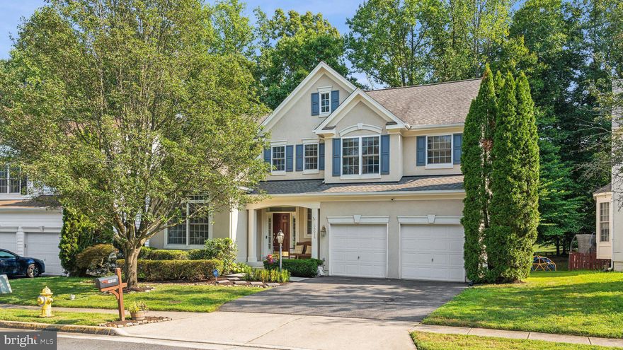 Welcome home to this lovely Colonial in the Ridgefield Oaks community.  This spacious 4 bedroom 3.5 bath home has tons of light filled windows, a tall vaulted main level office or perfect home classroom, large family room, finished basement with guest room space, additional office/movie room and walk up exit.  Plenty of outdoor space great for entertaining which includes a flat back yard, lovely rear patio, grilling space and more.  Additional features include 2 car garage, 3 finished levels and recent updates including new carpet, fresh paint, new water heater 2023, kitchen range, dishwasher, microwave 5 years old, washer/dryer 2022. Convenient location near shops, restaurants and Prince William parkway.