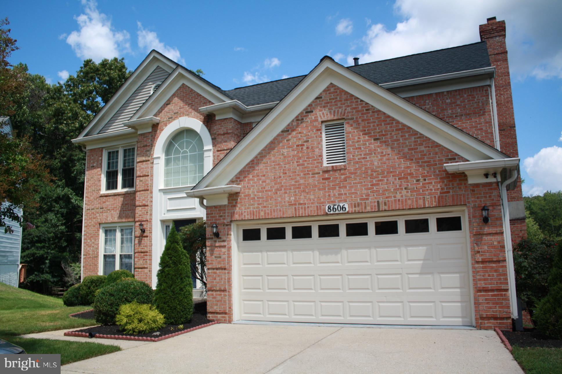 Nestled in the desirable Woodbridge Crossing neighborhood, this classic Colonial-style detached home offers a spacious 5 bedrooms, 4 bathrooms (including 2 full baths and 2 thoughtfully placed half baths), and about 2,272 sq ft of refined living space across three levels. Built in 1990, the home stands proud on a generous 0.23-acre lot (approximately 9,864 sq ft)—a perfect balance of indoor comfort and outdoor opportunities. Enjoy bright, open spaces with a main level half bath for guest convenience, and a cozy fireplace anchoring the living area for soft ambiance on quiet evenings. The fully finished basement adds significant functional square footage—ideal for a family room, play area, or home office. Comfort is assured year-round with central A/C (electric) and central heating (natural gas) systems in place, plus public sewer and water connections for modern reliability. The lot provides an extended driveway for parking multiple vehicles.