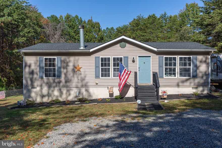 Offer deadline set for 6 PM on Monday, November 18. Sellers to review shortly after.
This charming country gem is a must-see. Experience peaceful country living on 2 beautiful acres, just minutes from all the stores and conveniences you need.

This lovely home, set on a permanent foundation, has received numerous updates. The HVAC system was replaced in 2018, a new roof was installed this year, and brand-new appliances were added in 2020. The water heater and well pump were replaced in 2017, as well as the pressure tank. For added convenience, there’s a 30-amp RV hookup for your vehicle.

Inside, each bedroom boasts spacious closets, and the separate mudroom/laundry room makes daily life easier. Outside, the large, mostly cleared yard offers privacy and is perfect for relaxation. On cool evenings, cozy up by the wood-burning fireplace. Best of all, there’s no HOA, so you can enjoy the freedom of country living. And with easy access to Rt. 3, everything you need is just minutes away!