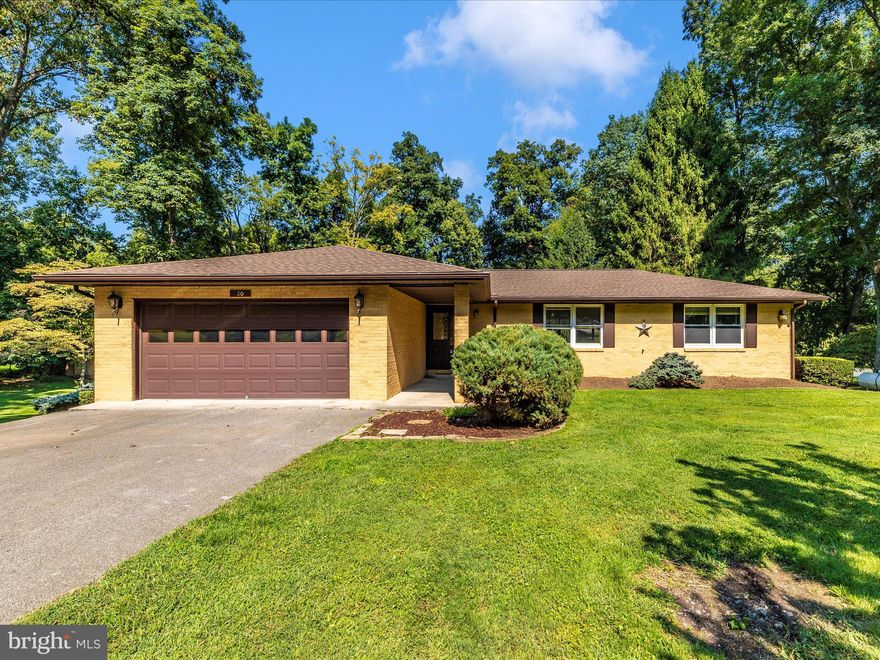 This charming 3-bedroom, 2.5-bathroom home is nestled on a generous 1.81-acre lot in the picturesque town of Charles Town, WV.  Offering the perfect blend of comfort, space, and tranquility, it is an ideal retreat for those who value both indoor and outdoor living.

Inside, the open and inviting floor plan connects the living, dining, and kitchen areas, making it perfect for both entertaining and everyday living. The kitchen offers ample counter space and a convenient layout, while the adjacent Florida room provides a peaceful spot to enjoy views of the expansive backyard.

The spacious primary suite includes an ensuite bath and a walk-in closet, offering a private retreat. Two additional bedrooms provide ample space for family or guests.

The walkout basement is a true highlight, featuring a finished rec room complete with a conveying pool table, a separate laundry room, and a versatile workshop area—perfect for a craft room or a wide range of hobbies.

Outside, the property shines with its large backyard filled with mature trees, offering plenty of room for play, gardening, or simply relaxing. Two covered patios provide ideal spots for outdoor dining or enjoying the serene surroundings in any weather.

With a two-car garage and plenty of driveway parking, this home is as practical as it is charming. Located in a peaceful neighborhood yet close to the amenities of Charles Town, 20 Southgate Circle is a rare find.