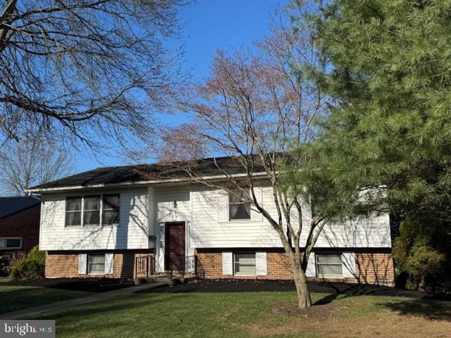 2-3 bedroom bi-level in convenient location on Lewistown's South Side.  This brick and vinyl home was built in 1985, much newer than surrounding homes. While there are only 2 bedrooms on the main level,  the 11x20 bedroom could be converted to 2 bedrooms. In addition, the large lower level family room could be used or modified for a 3rd bedroom. The kitchen has ceramic tile floors for easy clean-up and includes all the stainless steel Frigidaire appliances. The dining room has chair rail and a chandelier. The living room is spacious measuring 14'x17' and has generous windows. The primary bedroom has 3 lighted closets, and its own primary bath with tile floors and glass shower doors. The lower level contains the massive 16' x 24' family room with a siding patio door that leads to a 10'x20' covered, concrete patio.  The laundry room/half-bath combination has built-in cabinets and ceramic tile floors.  A storage room has tons of shelving for even more storage. The back yard  adjacent to the patio is fenced in, for your pets/children's safety. A paved rear driveway leads to a 1 car integral garage with automatic opener.