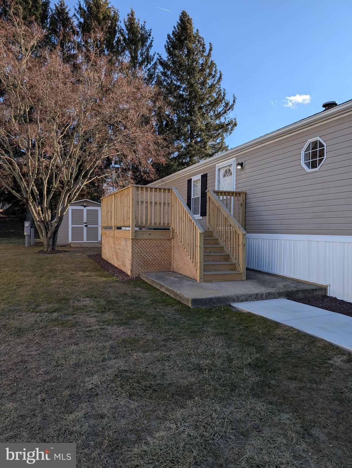 Completely remodeled single wide mobile home in Taylor's Mobile Home Park, a 55+ community of well kept home located with easy access to major routes and shopping. New windows, doors, floor coverings, paint, appliances, decks and more. Primary bedroom w/full updated bath, large kitchen with lots of cabinets, new SS appliances and pantry cupboard, updated general bath w/ceramic tiled shower. new 10'x12' front deck and 6'x'11 rear deck and storage shed. Great home in a great location - Don't miss it!!