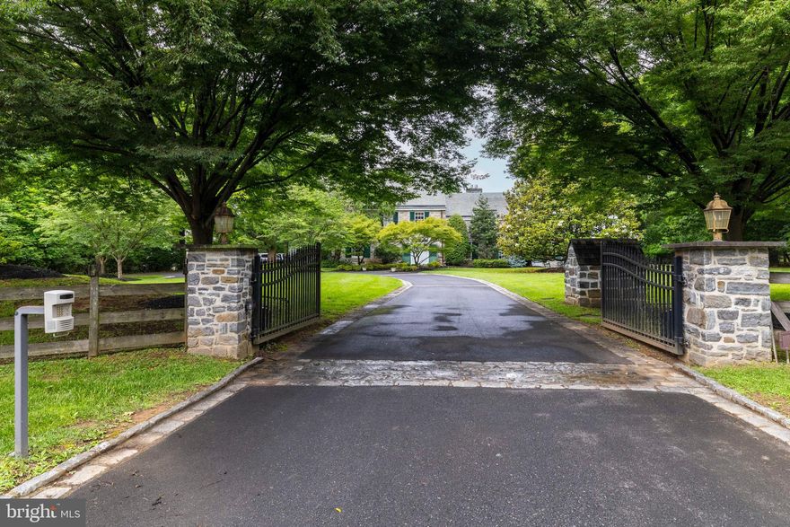Located in the heart of Springfield Township, 107 East Mill Road is more than just a home; it is a sprawling stone manor that captures the timeless elegance of Montgomery County’s storied past while offering modern luxury.

A Legacy in Stone: The Manor’s History
Built in 1937, this residence was born during an era when Flourtown was transitioning from its colonial milling roots into one of Philadelphia’s most prestigious suburban retreats. The house stands as a testament to the region's "Manor House" tradition, using local stone to convey a sense of permanence and grandeur.

While the original structure anchors the property in pre-war craftsmanship, the home has evolved through two significant additions. Shortly after the current owner purchased 107 E Mill in 2000, two transformative wings were added, and in 2020 a resort-style pool house was built

The Flourtown Connection
To live on Mill Road is to live within the history of Flourtown itself. Named for the wheat mills that once lined the Wissahickon Creek in the 1700s, the area served as a vital supply hub for the Continental Army during the Revolutionary War. Nearby landmarks like Hope Lodge and the Black Horse Inn remind residents of the town’s role in the birth of the nation, a heritage that is echoed in the thick stone walls and stately presence of this property.

Architectural Excellence & Interior Grandeur
Spanning across 2.25 pristine acres, the estate offers an expansive floor plan designed for both intimate family life and large-scale entertaining.

The Culinary Heart: The home features a masterful kitchen layout, including a formal eat-in kitchen and a separate breakfast room. For grander gatherings, the family great room boasts soaring cathedral ceilings and is serviced by a second full kitchen, ensuring effortless hosting.
Refined Living: The main level is a symphony of classic spaces, including a formal dining room, a quiet library, and a sun-drenched sitting room.
Entertainment Wing: The lower levels and secondary wings are dedicated to leisure, featuring a professional media room, a billiard room complete with a wet bar, and a wine room.
Wellness & Rest: With 6 bedrooms and 10 bathrooms, there is no shortage of private retreats. The basement serves as a private spa with its own sauna, perfect for unwinding.
The Grounds: An Outdoor Oasis
The exterior of the property is a private parkland, with a "deep yard" feel that is rare in the region.

The Pool & Pool House:  the fenced-in pool area has a pool house fully equipped with a kitchenette and full bath, washer and dryer, making it a self-contained guest suite or the ultimate summer clubhouse, 
Terraces & Patios: Multiple stone terraces and patios extend from the manor, providing a seamless transition between the indoor luxury and the expansive 2.25-acre lawn.
The Garage: A spacious 3-car garage provides ample storage and convenience, matching the stone aesthetic of the main house.
This East Mill Road estate is a rare opportunity to own a piece of Springfield Township history, reimagined for the modern homeowner.