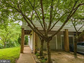 A beautiful 3 Level End Unit Town home with 3Bed/ 3.5 Bath that is Airy, Spacious and with Bountiful Natural Light with its own parking garage. A walkway leads you to the main door that values your privacy. Immediately lift your spirits as you enter the home to the gleaming Brazilian Cherrywood floors that invite you to a spacious living room for entertaining; a cozy fireplace to warm your soul in the winter or grab your book and perch outside on either of the two level patios facing the flowering shrubs and trees in the summer to enjoy your tranquility. Simply park in your garage or in the driveway and convert your garage into your hobby land that already includes equipment racks, Workman’s bench with choice tools, pulley mounted workman’s light and music system speaker. Upper level includes two separate spacious bedrooms with their own attached baths with the master suite with its own walk-in closet. Lower level can have its own separate entry with a den, bedroom and a full bath. Newer Carpet, flooring in upper and lower levels, Paint, HVAC and Washing Machine. Additional storage in attic. Ample parking space for visitors, close to seneca greenway trail, close to shopping and I-270. Residency includes access to over 6 swimming pools, over 300 acres of parkland, ballfields, playgrounds, walking paths, sports courts (tennis, pickleball, soccer, basketball), picnic areas and nature observation opportunities. The summer to enjoy your tranquility. Simply park in your garage or in the driveway and convert your garage into your hobby land that already includes equipment racks, workman bench with choice tools, pulley mounted workman light. Upper level includes two separate spacious bedrooms with their own attached baths with the master suite with its own walk-in closet. The owner pays HOA (HOA takes care of trash and snow removal.