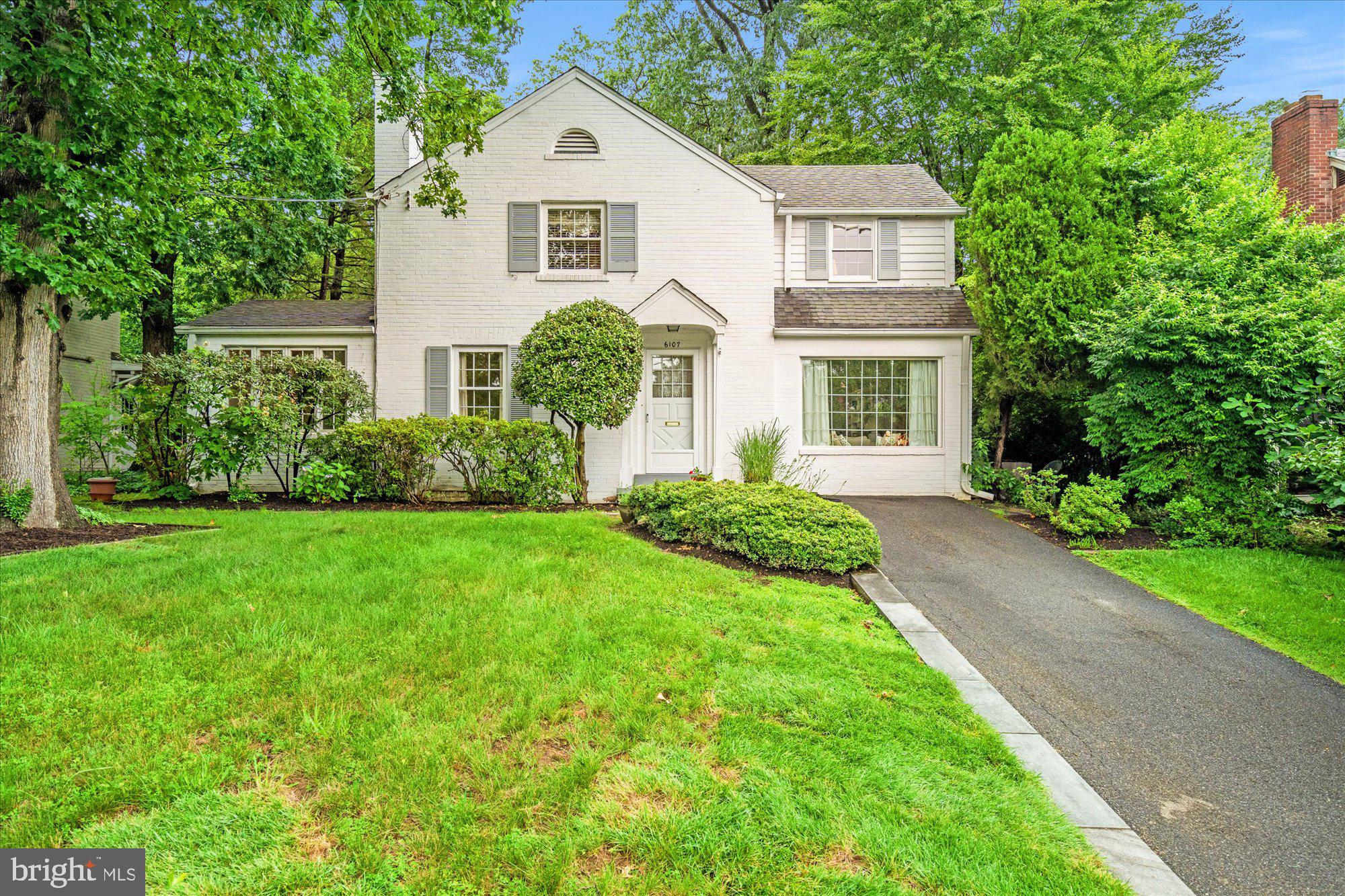 Welcome to this timeless Wood Acres Colonial, lovingly maintained by the same family for 57 years and thoughtfully updated for modern living. Blending classic charm with today’s comforts, this home features an open eat-in kitchen that flows into a spacious family room—perfect for gatherings and everyday life. Upstairs, you'll find three comfortable bedrooms, while the lower level offers a fourth bedroom—ideal for guests, a home office, or an au pair suite. A bright sunroom provides serene views of the flagstone patio and expansive, level backyard, creating a seamless connection between indoor and outdoor spaces. Set on a generous 9,000 square foot lot in the heart of the highly sought-after Wood Acres neighborhood, this home provides the ideal backdrop for entertaining, gardening, or quiet relaxation.
Enjoy easy access to scenic parks, top-rated schools, and the vibrant shops and restaurants of Westbard and downtown Bethesda. A rare opportunity to own a beautifully cared-for home in one of Bethesda’s most cherished communities.