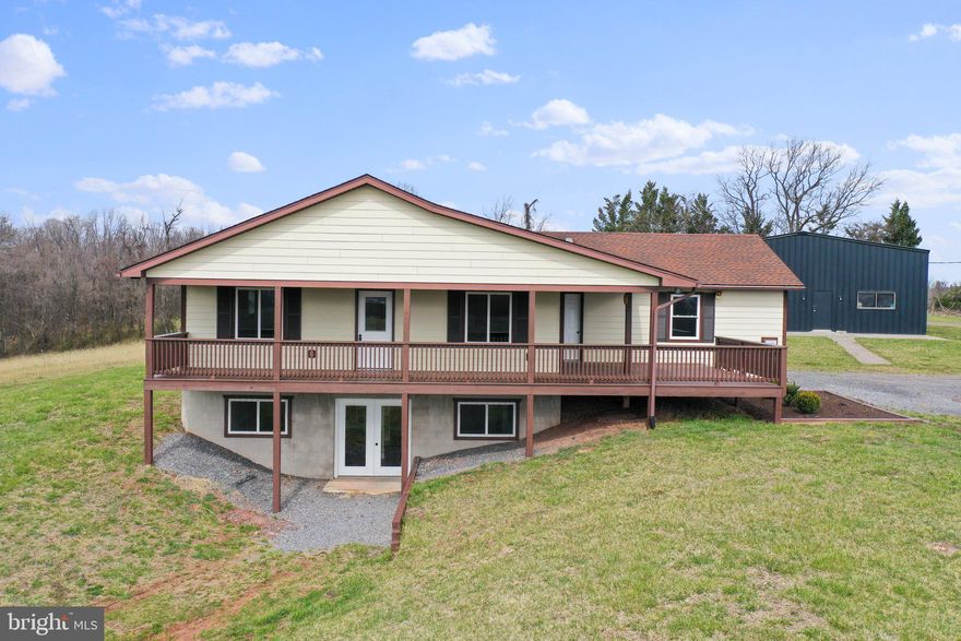 Escape to the peacefulness of West Virginia's majestic mountains with this meticulously renovated 2009 ranch-style home. Perched on a sprawling 7.39-acre parcel, this property offers more than just a home—it's a lifestyle. Step inside to discover a haven of modern luxury and comfort. The top-to-bottom renovation has transformed this home into a sanctuary, boasting 3 bedrooms and 3 full bathrooms, each exuding style and functionality. The fully finished basement adds even more space, perfect for entertaining or unwinding after a day of adventure. But it's the panoramic views that truly steal the show. Whether you're sipping your morning coffee on the porch or hosting a gathering in the spacious backyard, you'll be captivated by the beauty that surrounds you. And with no HOA restrictions, you're free to make this property your own, without any limitations on your creativity or freedom. And let's not forget about the impressive 3,500+ sq. ft. detached garage/shop. With space for four cars and plenty of room for storage or workshops, it's the ultimate headquarters for mountain living. Conveniently located just outside of Romney, WV, you can reach Winchester, VA in under an hour from your front door. Whether you're looking for a peaceful retirement retreat, a vacation home, or a place to call your own year-round, this Hampshire County jewel has it all.