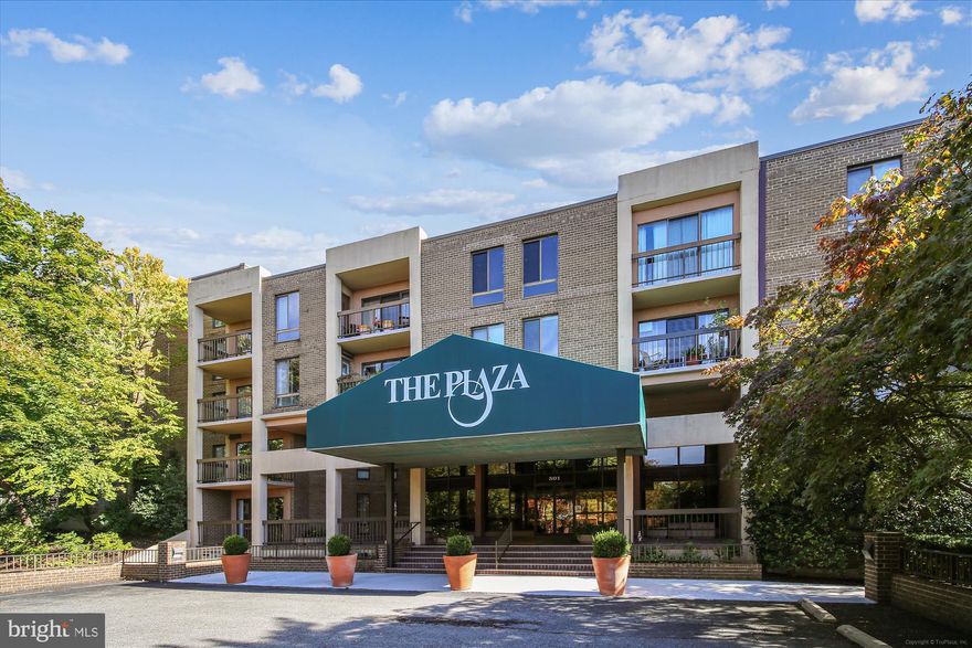 Luxury living at The Plaza.  TOP FLOOR WITH FIREPLACE.  
This 2 Bedroom 2 Bath condo features a living room and separate dining room or office, a kitchen with eat-in space and lots of cabinets, primary bedroom with renovated bath and walk-in closet and a second full bedroom and full bath.  The balcony enjoys views over the quiet courtyard.  There is a washer/dryer in unit.  Garage parking and parking on the parking lot.  The owner controls the heat/AC themselves.  The Plaza is a luxury building with on-site management in a top Alexandria City location close to the hospital and close to shopping.