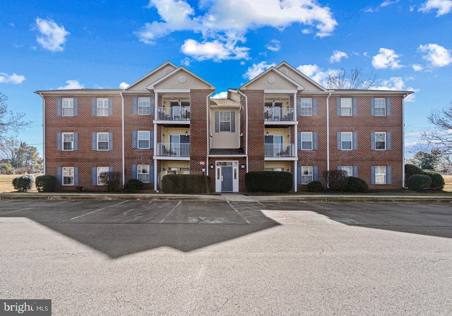 Welcome to your new sanctuary! Nestled on the second story, this hard to come by, light filled condo offers a seamless blend of space and comfort. With a spacious open-concept layout, perfect for modern living.

Newer: carpeting, dryer, microwave, and refrigerator are just the beginning of what this move-in-ready gem has to offer. Enter into a spaceous open-plan living area, where the living room seamlessly flows into a dining space, and a convenient pass-through bar adds a touch of elegance keeping the kitchen connected to the main living area.  The kitchen features a cozy dining nook, while a discreetly tucked-away closet cleverly conceals the washer and dryer for maximum functionality.  A sliding door off the living area opens to your private balcony, perfect for enjoying your morning coffee while gazing out at the trees.

The primary bedroom is spacious, light filled, and complete with its own en-suite bathroom featuring a stand-up shower, and a large walk-in closet. Meanwhile, the second bedroom enjoys easy access to a second full bathroom with a tub-shower combination.

Best of all, a separate storage room with its own allocated unit on the same floor provides ample space for all your seasonal decorations and more, keeping your home organized and clutter-free.

Don't let this opportunity slip through your fingers – seize the moment and make this condo yours today!
Conveniently located near commuter routes, including Rt. 340, parks, and shopping destinations, this apartment offers the perfect blend of tranquility and accessibility. 
Say hello to your new home sweet home!