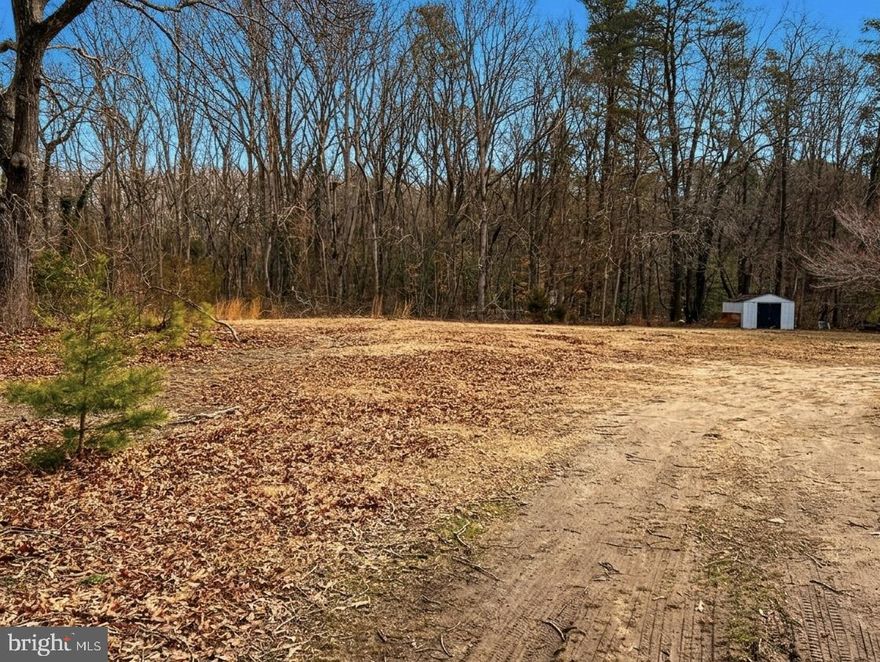 WANT LAND TO BUILD?! This one is ready to go! Bring your builder or use ours :) 
Imagine coming home to nearly an acre of your own private Maryland retreat. Located in the heart of Lusby, this property at 12156 Rousby Hall Rd offers the ultimate canvas for your new home.
Whether you’re heading to PAX for work or spending the day in DC, the commute is a breeze. The heavy lifting has been handled: the land is cleared, the driveway entrance is set (neighbor to the right uses the front section of the driveway), and the perc test is approved until 2028. It’s rare to find a lot this "plug-and-play" in such a sought-after location. Enjoy the best of Calvert County living with modern convenience and significant upfront savings!