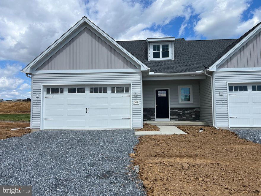 End of May Completion- New Phase of StoneyBrook Development in Elizabethtown! Discover easy, maintenance-free living in this exciting new phase of the StoneyBrook community, featuring 44 beautifully designed duplex homes. The Bakersfield floor plan offers a first-floor primary suite complete with a walk-in closet, a luxurious en-suite bath featuring a 5-foot tile-surround walk-in shower, and a double bowl vanity. The open-concept main level includes a spacious kitchen with 42-inch cabinets, a large 5-foot island, and a pantry, flowing seamlessly into the dining area and family room—perfect for entertaining. Additional conveniences include a first-floor laundry room and a half bath. Upstairs, you’ll find two additional bedrooms, a full bath, and a versatile loft area. Enjoy scenic views from your rear patio or deck and take advantage of the neighborhood’s extensive paved walking trails. Snow removal and lawn care are handled by the HOA, allowing you to relax and enjoy your new home.   Property taxes will be calculated once home is assessed.