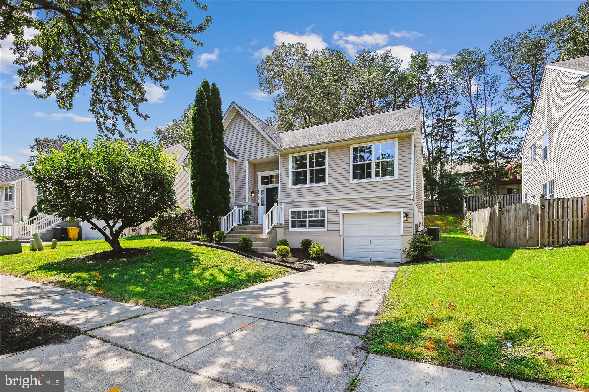 2.25% VA Assumable Loan Opportunity!
Welcome to 1431 Illinois Ave, nestled in the Ashton subdivision—ideally located for commuters: just minutes from BWI, Fort Meade, I‑97, MD‑32, and easy access to Annapolis, Baltimore, and DC. Enjoy the advantage of inheriting an exceptionally low VA loan rate, offering substantial long-term savings.
This charming split-level home sits on a spacious lot and offers 3 bedrooms and 2.5 baths across 2,186 sq ft. Bright and inviting, the entry-level flex room features floor-to-ceiling windows—perfect for a home office, sitting area, or play space. The upper-level open-concept living, dining, and kitchen area offers direct access to a newly stained-and-sealed deck (2023, refreshed in 2025), ideal for entertaining. A finished lower level provides additional living space—great for a family room or remote workspace.
Thoughtfully upgraded, this home includes a 2020 roof, 2023 deck (stained and sealed in 2025), 2017 water heater and sump pump, 2022 HVAC, 2024 dishwasher, and 2021 washer and dryer—ensuring turnkey comfort and peace of mind. The property also integrates modern convenience with a Vivint smart-home system featuring a control panel, doorbell and driveway cameras, two indoor cameras, and a smart thermostat.
Additional perks include a one-car attached garage plus driveway parking, and a large temperature-controlled unfinished storage area spanning the full width of the home—with the potential to convert into a fourth bedroom.
Live at the intersection of convenience, thoughtfully upgraded comfort, and smart investment—all wrapped in a vibrant, commuter-friendly community!