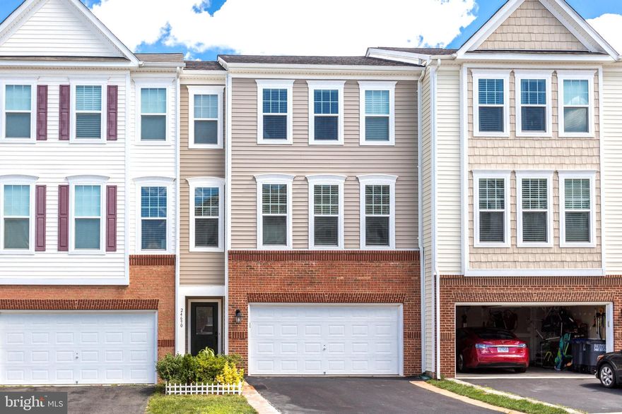 IMMEDIATELY AVAILABLE!    Spacious and bright three-level townhome with a two-car garage is located in the highly sought-after Stone Ridge community. Just painted top to bottom.  Enjoy a gourmet kitchen featuring stainless steel appliances, gas cooking, a large island, and a cozy gas fireplace. The open-concept floor plan, high ceilings, and oversized windows fill the home with natural light. The primary suite includes a tray ceiling, walk-in closet, and en-suite bath. All bedrooms feature ceiling fans for year-round comfort. *No rear deck.  With three full bathrooms plus a main-level half bath and an upstairs laundry room, this home offers convenience and style throughout. Stone Ridge is known for its exceptional amenities—community pool, tennis courts, fitness center, and walkable access to shops and public transportation.