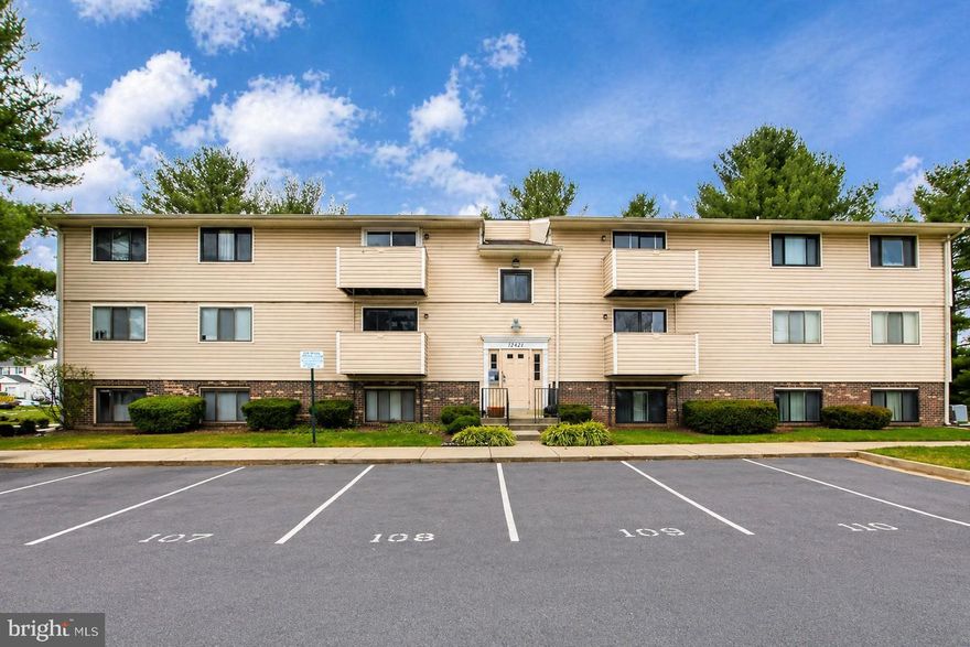 Welcome to 12421 Hickory Tree Way Unit M, a beautifully renovated and move-in-ready 2-bedroom, 2-bath top-floor condo offering stylish updates, comfort, and privacy in a secure building with intercom access. This bright and inviting 899-square-foot home features a spacious open layout with brand-new LVP flooring, new underlayment and moisture barrier, fresh paint throughout, and thoughtful upgrades in every room. The living and dining areas flow seamlessly, creating an ideal space for everyday living and entertaining, while a private balcony offers the perfect spot for morning coffee or relaxing outdoors.

The updated kitchen includes newer cabinets (2022), a brand-new countertop, sink, and drain, along with updated appliances including a new range, dishwasher, and a under-cabinet range hood with light. The spacious primary suite features an ensuite bath, while the second bedroom and full bath offer flexibility for guests, a home office, or additional living space. Both bedrooms include updated lighting and new closet hanging systems. Additional improvements include a new water heater (2023), an updated hall bathroom with a new toilet, LED-lighted mirror, and custom-built shelving.

Enjoy the convenience of an in-unit laundry room, an assigned parking space, and an excellent Germantown location close to shopping, dining, parks, recreation, and major commuter routes. This meticulously improved top-floor gem is ready to impress.