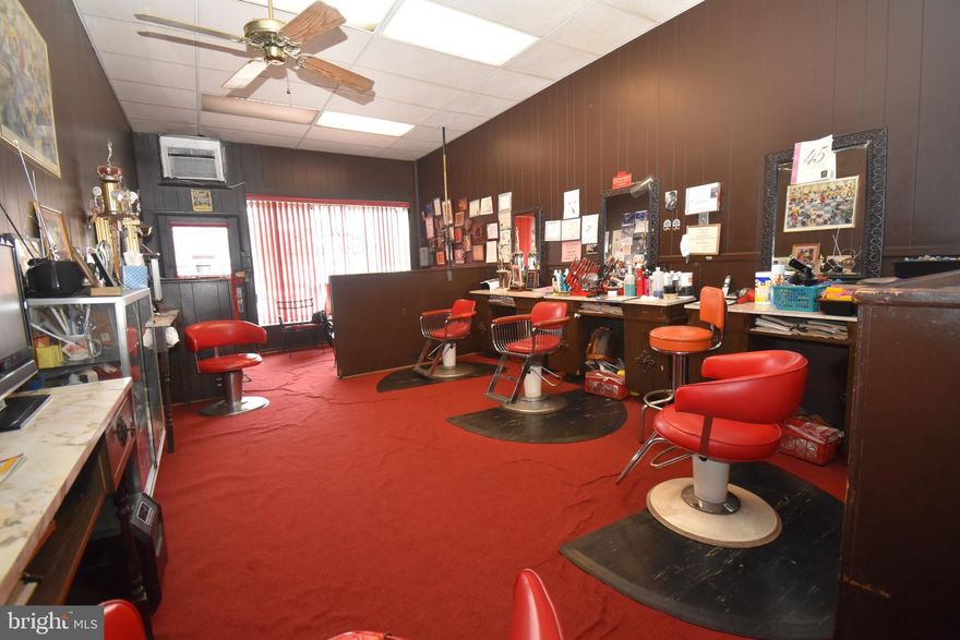 The First Floor is a Commercial Space which consists of a Fully Equipped  Beauty Shop with 5 Work Stations, 2 Shampoo Bowls, 3 Dryer Stations, Waiting and Reception Area.*Second level Offer  2 bedroom Apartment with a Separate Entrance*You could also Operate you Business on First Level  and  Live or Rent the Second Level Apartment*Great  Potential Income. Upgrades includes New Heating System and Newly Renovated Second Floor Apartment.