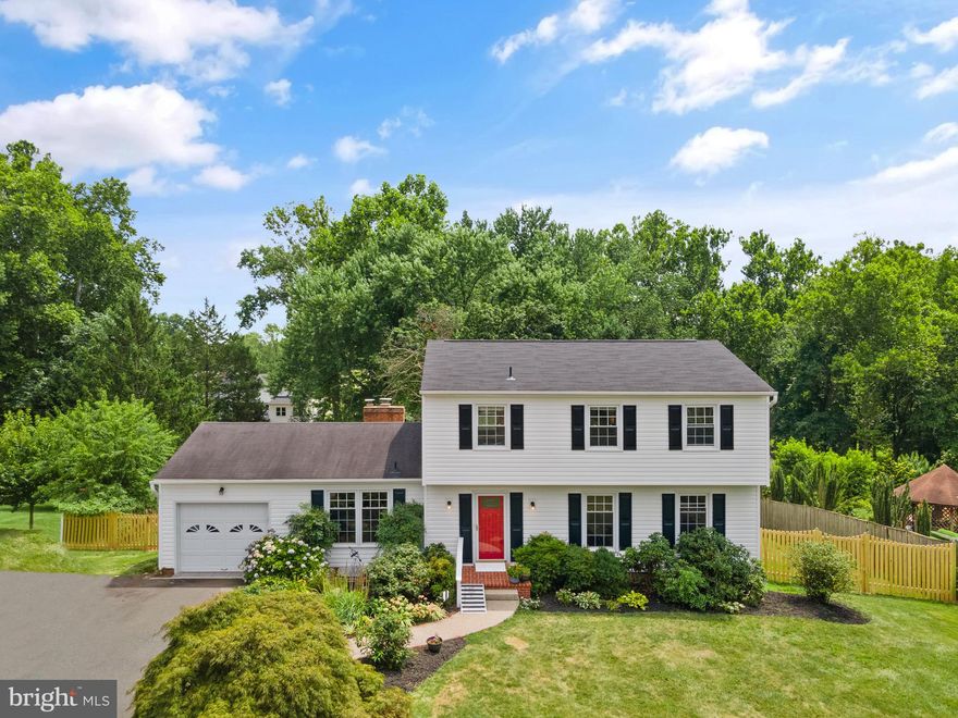 Welcome to 13609 Mountain View Ct., where charm meets spacious comfort and unbeatable convenience. Situated on an expansive half-acre lot with a fully fenced private rear yard large enough for a pool, this single-family home offers five legal bedrooms and 3.5 bathrooms across nearly 3000 sq. ft. of finished living space spanning three levels.

Inside, you'll discover a beautifully renovated kitchen and bathrooms, complemented by hardwood floors, recessed lighting, fresh paint, and a fully finished walk-out basement, making it an ideal sanctuary to call home.

The main level features a spacious living room flowing into the dining room and an expanded kitchen, perfect for both entertaining and everyday living. A cozy family room with a wood-burning fireplace and access to the one-car garage adds to the home's functionality. The beautiful renovated kitchen has 42 in cabinets, granite countertops, tile backsplash, and stainless steel appliances. 

French doors off the dining room lead to an extended deck, ideal for outdoor enjoyment and hosting gatherings. The neighborhood provides easy access to Floris Elementary School and is conveniently located near major commuting routes, dining, and shopping destinations.

Upstairs, four bedrooms and two renovated full bathrooms await, each adorned with hardwood floors except for one room with carpet.

The lower level boasts new luxury vinyl plank flooring in a large recreation room complete with a wet bar, alongside a laundry room, full bathroom, and a fifth bedroom.

Don't miss the chance to make this exceptional property your next home. Schedule a showing today and envision yourself living at 13609 Mountain View Ct., where comfort, style, and practicality converge in this sought-after community.

Roof 2018, HVAC 2014, H20 Heater -2014, Windows 2012 or 2013, Kitchem remodel and most appliances 2013, Kitchen cooktop 2018, Basement finished 2016, Primary Bath remodel 2023