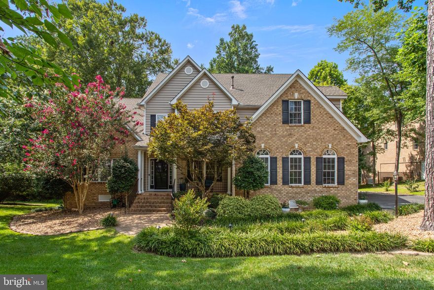 Welcome to your own private oasis in the highly desirable community of The Highlands. 
This elegant home offers over 4,400 square feet of thoughtfully designed living space, beautifully situated on a landscaped one-acre lot that backs to a peaceful creek.. From the moment you enter, you'll be impressed by the open floor plan, soaring 18-foot ceilings, and dramatic staircase. The formal dining room exudes elegance with crown molding, chair rail, picture frame molding, and custom shutters. Just off the kitchen, the great room invites you in with its abundance of natural light, gas fireplace with custom mantle, and an airy open loft above.

The gourmet kitchen has been upgraded with professional-grade stainless steel appliances, a gas cooktop, multi-function microwave and convection oven, granite countertops, tile backsplash, a striking bi-level island with contrasting cabinetry, and a mixer stand that lifts to counter height. Ample roll-out storage, recessed lighting, and natural light make this kitchen as functional as it is beautiful. A door from the kitchen leads directly to a screened-in porch, the perfect spot to enjoy quiet mornings or relaxing evenings while overlooking your private backyard and tranquil creek.

The main-level primary suite offers a peaceful retreat complete with crown molding, custom shutters, a spacious walk-in closet, and a luxurious en-suite bath featuring a huge tiled shower and split vanities with quartz countertops, remodeled in 2020. The fully finished, ground-level daylight basement provides exceptional versatility, including a spacious recreation room and a private 18'x12' multi-purpose room ideal for a guest suite, home office, gym, or in-law space. Upstairs, generous bedrooms offer great closet space and brand-new carpet installed in 2025, with the primary bedroom carpet updated in 2024.

Additional upgrades include a new roof (2018), new HVAC units (2019), a brand-new AC unit for the top level, a three-zone irrigation system (2021), and security lighting (2023). A whole-house Generac generator provides added peace of mind, and the efficient laundry room includes a utility sink. Outdoor living is a dream with a 32'x22' rear deck and a 16'x14' screened porch featuring a ceiling fan and light—both overlooking your private backyard surrounded by trees and nature.

Living in The Highlands means you can vacation at home, enjoying resort-style amenities like a community pool and splash park, tennis courts, playground, lake, scenic trails, picnic areas, and an award-winning 18-hole championship golf course with a clubhouse restaurant. This exceptional home blends comfort, style, and functionality in a setting that feels like a retreat. Schedule your private showing today!