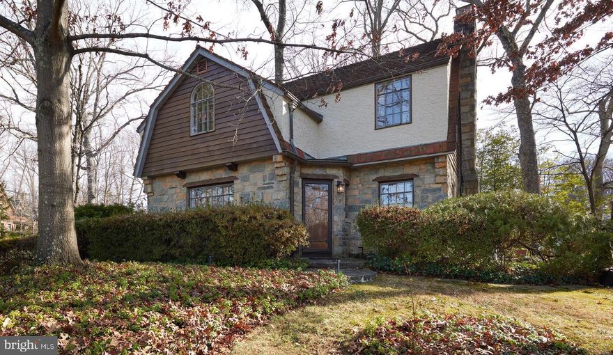 New Price!<p><br>

Stunningly renovated (2023/24) and meticulously maintained 1936 English stone and timber English Tudor on a large .27 acre lot with 2 car attached garage.<p>

The main level of this fabulous home boasts oak ceiling beams, hardwood floors, a stone fireplace, a balcony off the dining room and other period details while incorporating a fully updated modern kitchen, dining room and coffee area, with a new huge quartz island, all new high-end appliances and new cabinetry. Updated powder room with top Grohe collection.<p>

The Second level features a spacious primary suite with a fully updated bathroom, 3 additional bedrooms and a renovated hall bath. Like the powder room, both second level bathrooms feature all new top of line Grohe fixtures.<p>

The third level loft, complete with built-in shelves, skylights and large windows is ideal for a private office, reading area or playroom/art studio.<p>

Fully updated finished basement which accesses the 2-car garage has a recreation room/gym, ample storage and the ability to add an additional bedroom and bathroom. All appliances are new. Fully updated electric system with new circuit breaker box along with an EV equipped charging outlet.<p>
Large beautiful wooded backyard provides great privacy and is ideal for relaxation and entertainment. Huge corner lot with many mature trees. Blooming azaleas in spring time in all around the yard (back and front) compete with DCs famed Cherry blossoms.<p>

Walt Whitman school district.<p>
